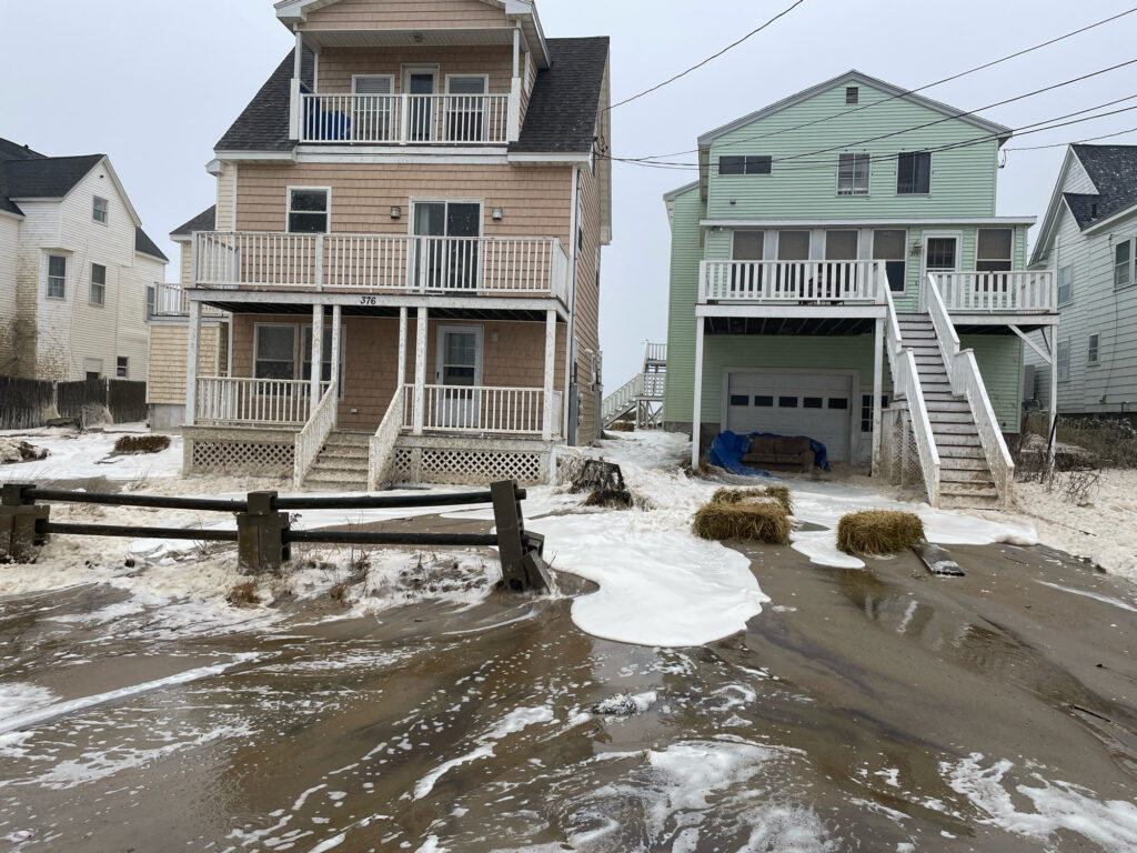 a row of houses on a beach (MyCoast AI)