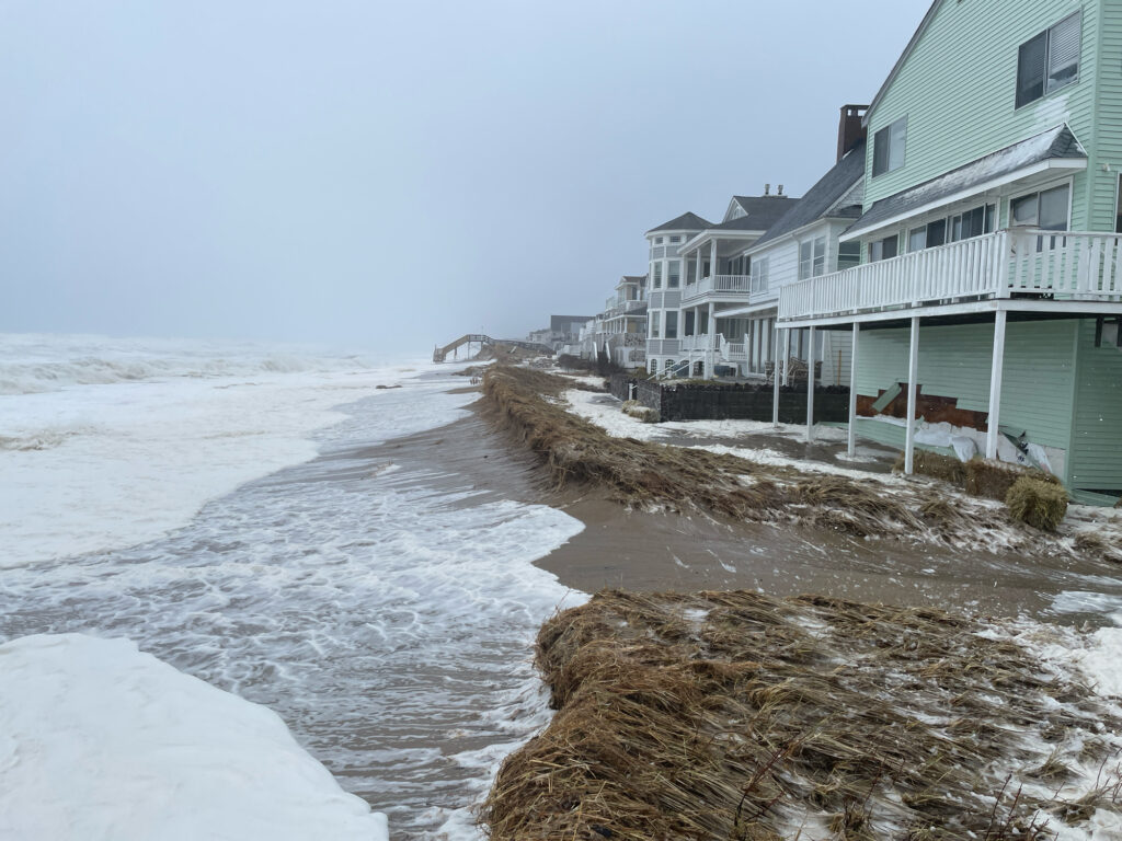 a row of houses on a beach (MyCoast AI)