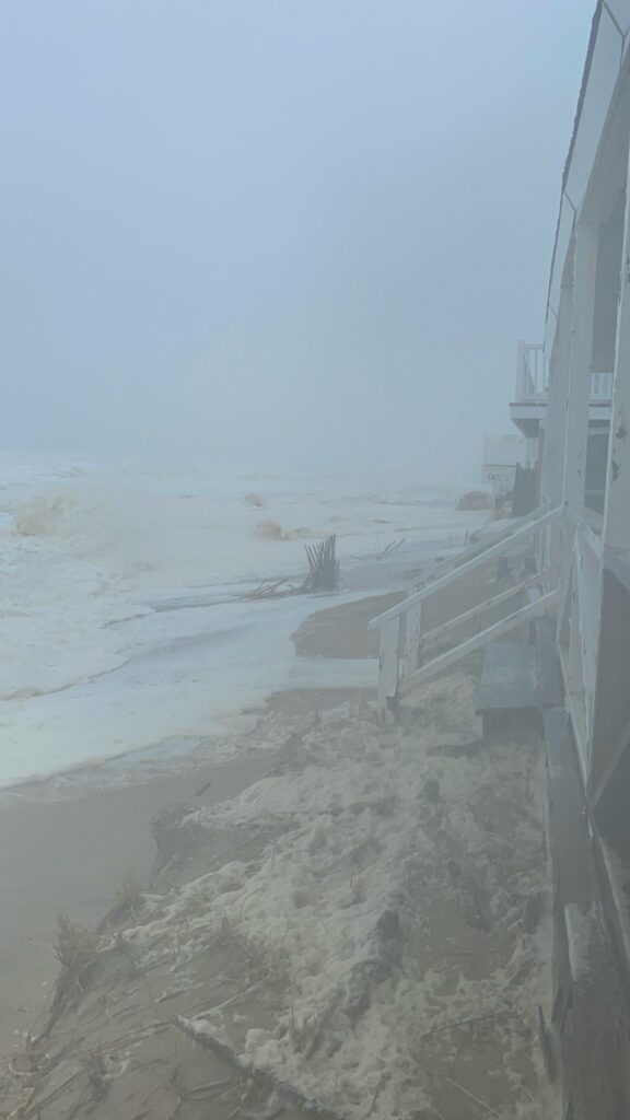 a building with a beach and snow (MyCoast AI)