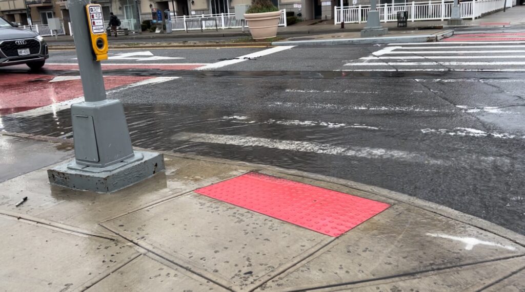 a crosswalk with a red sign (MyCoast AI)