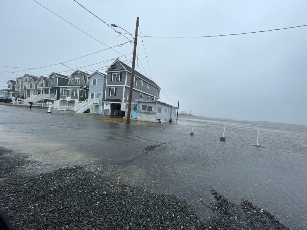 a row of houses on a beach (MyCoast AI)