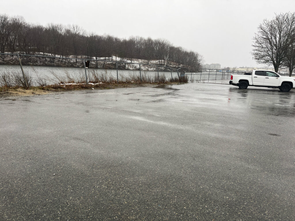 a car parked in a parking lot (MyCoast AI)