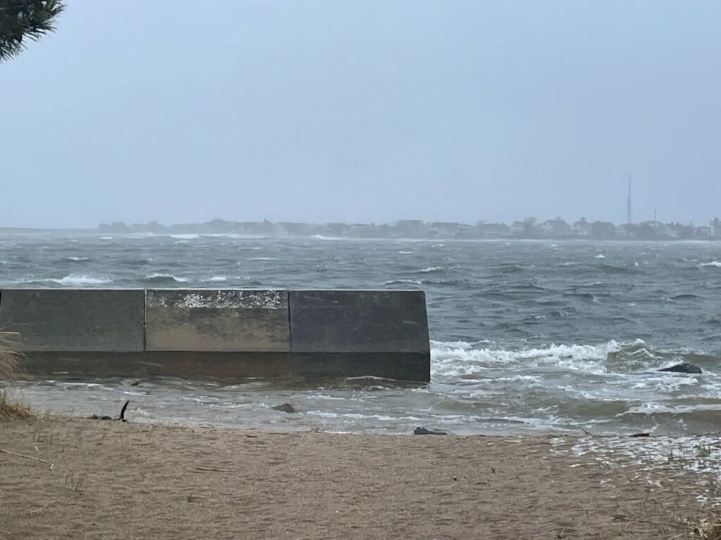 a concrete bench on a beach (MyCoast AI)