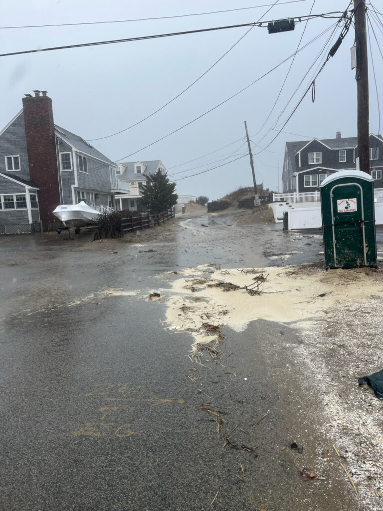 a flooded street with houses (MyCoast AI)
