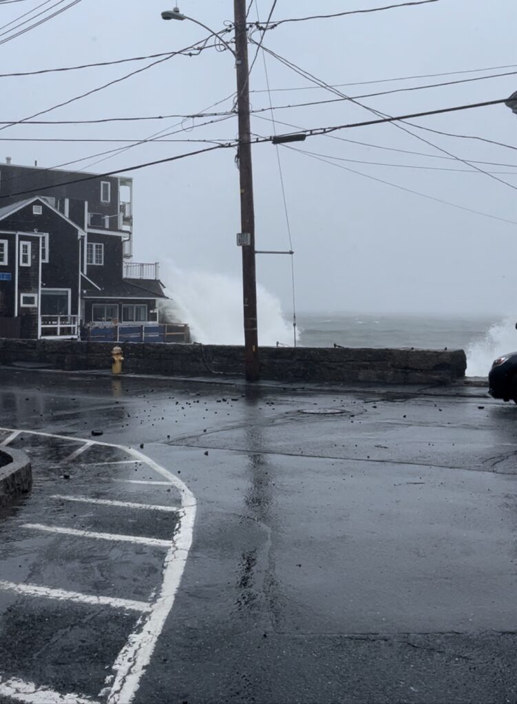 a street with power lines and buildings (MyCoast AI)