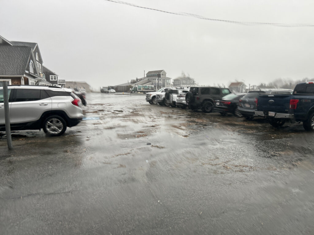 a flooded street with cars (MyCoast AI)