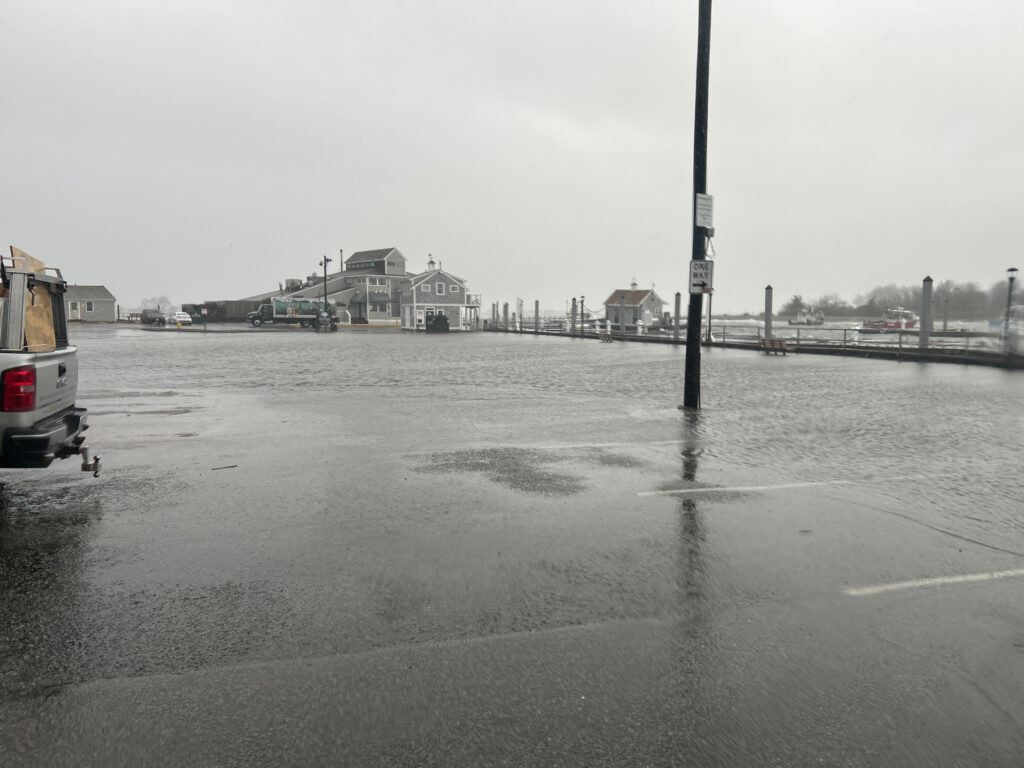a flooded street with a pole (MyCoast AI)