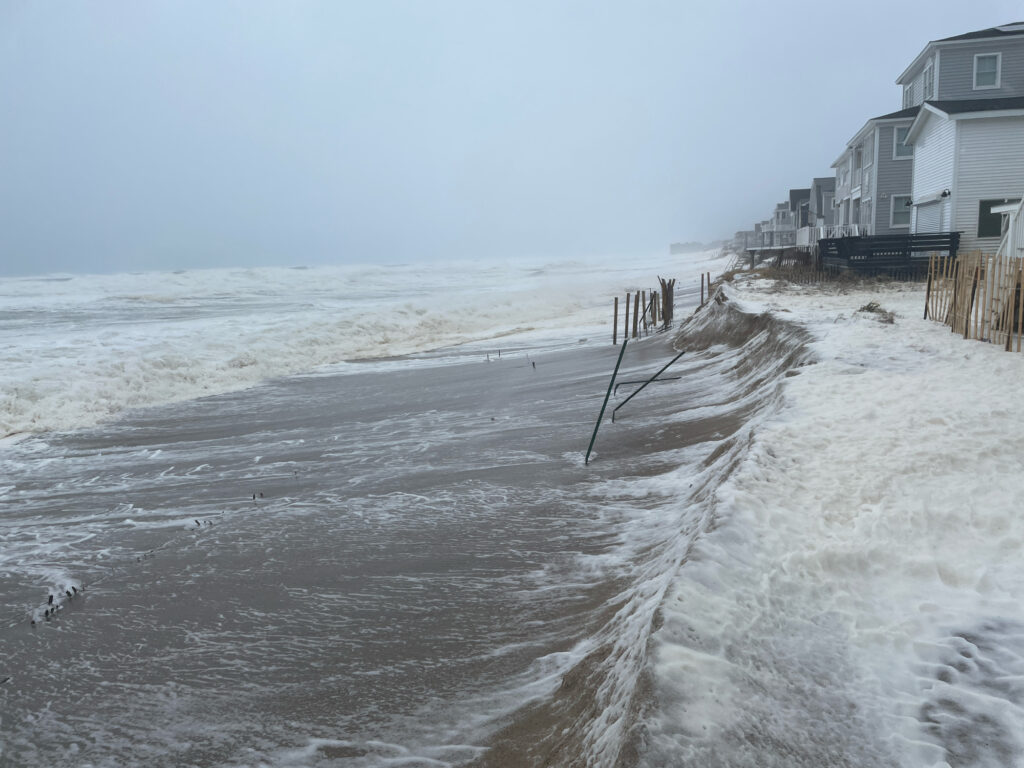 a beach with waves crashing on it (MyCoast AI)