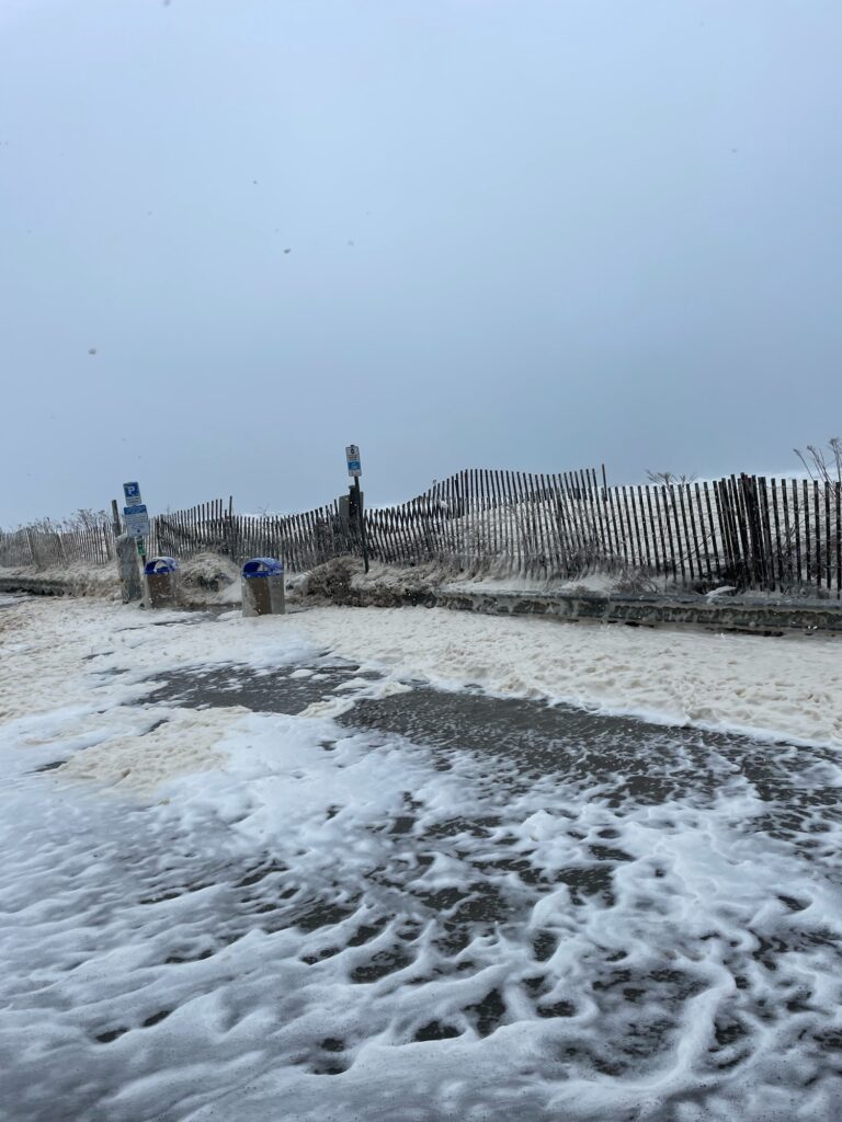 a snowy field with a fence and a fence (MyCoast AI)