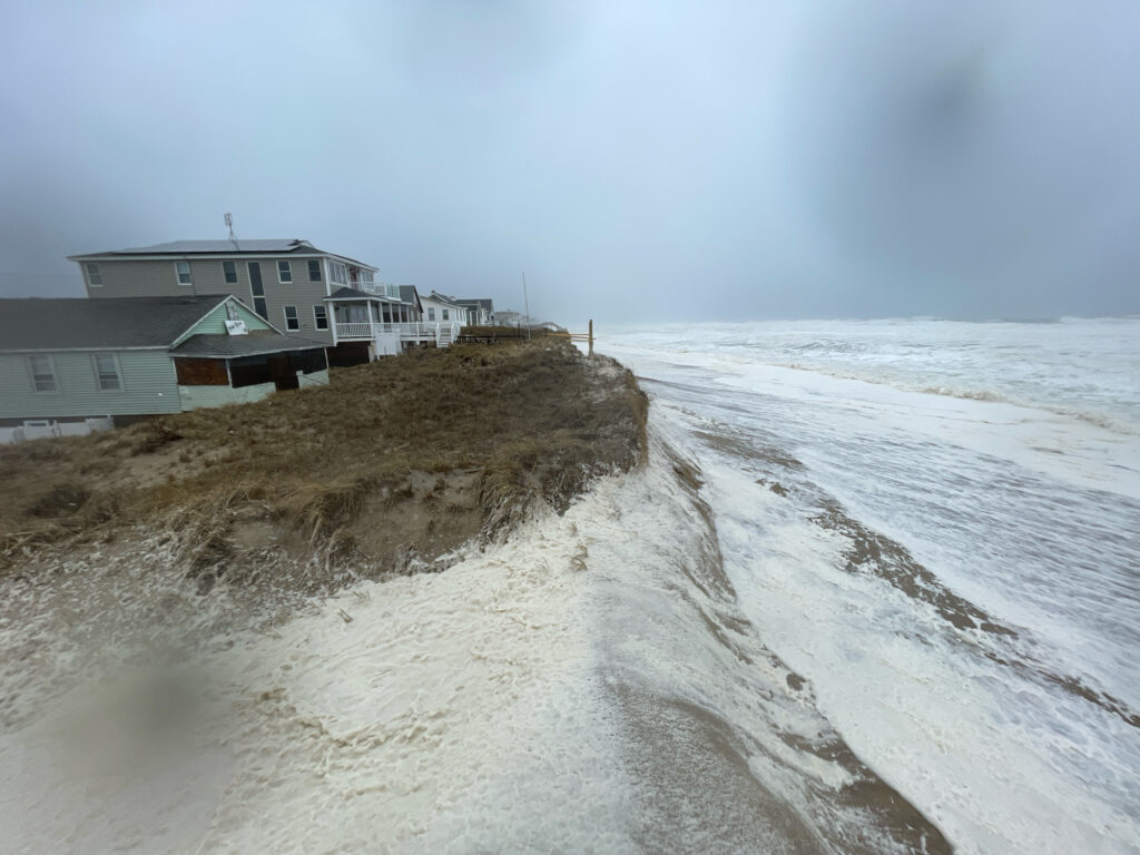 a beach with houses on it (MyCoast AI)
