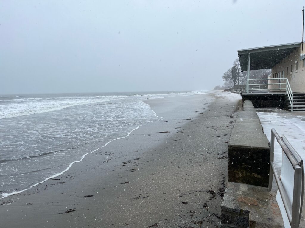 a beach with waves crashing on it (MyCoast AI)