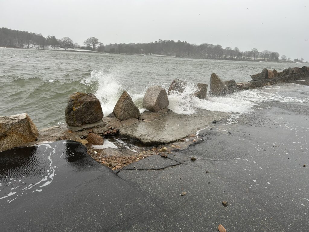 a rocky beach with waves crashing (MyCoast AI)