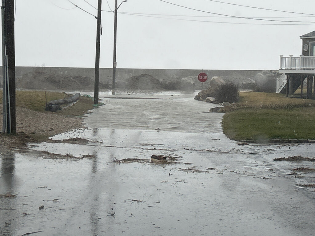 a flooded street with a stop sign (MyCoast AI)