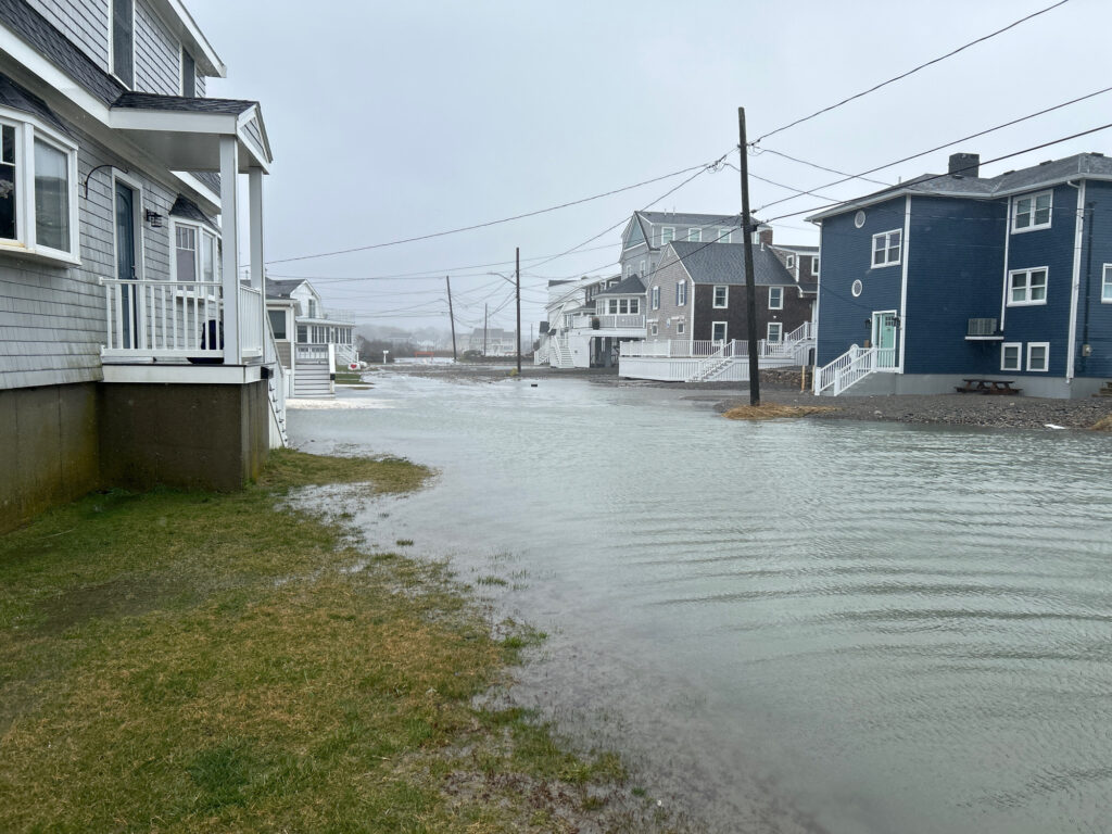 a body of water with houses along it (MyCoast AI)