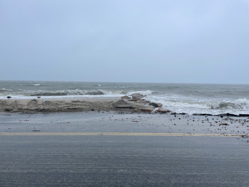 a beach with waves crashing (MyCoast AI)