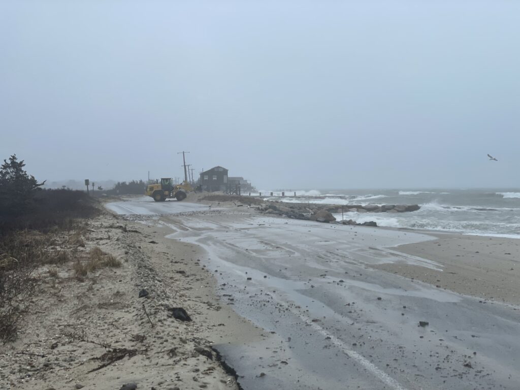 a beach with waves crashing on it (MyCoast AI)