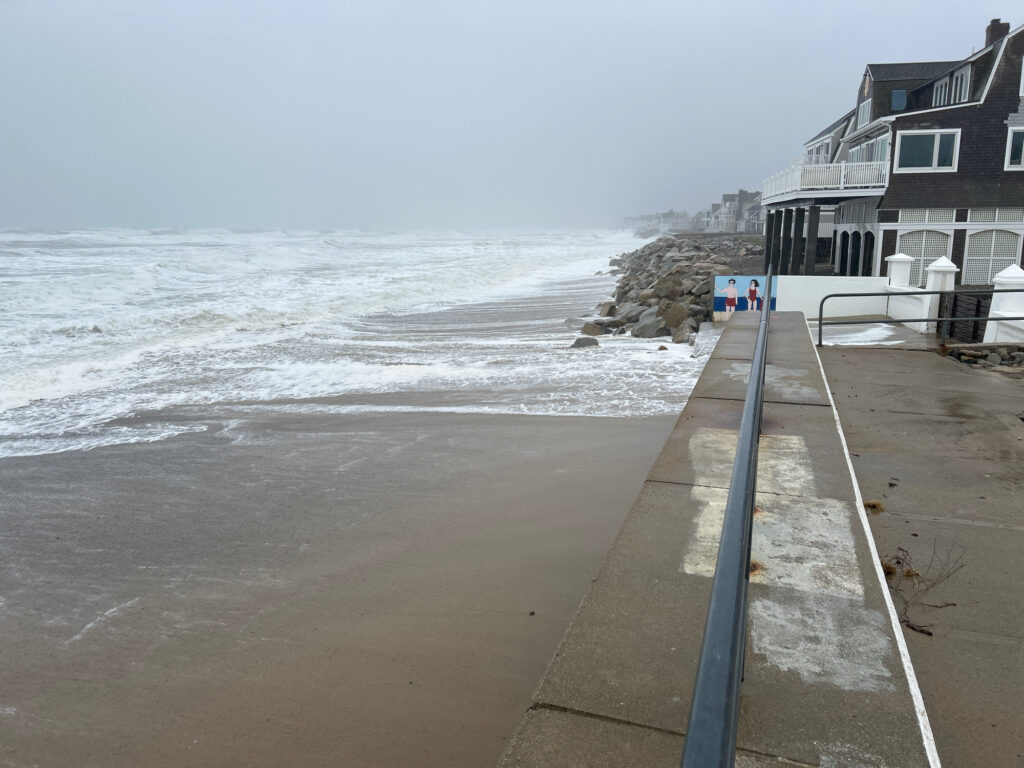 a beach with waves crashing on it (MyCoast AI)