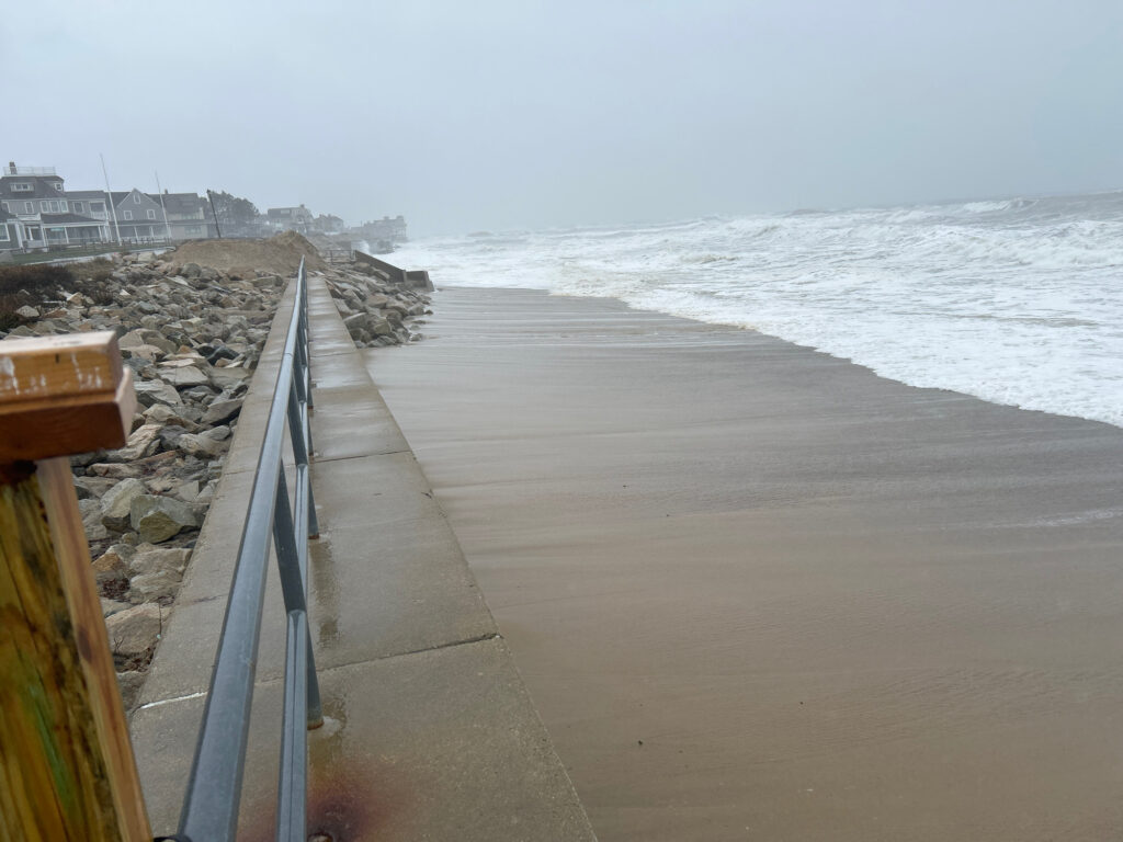 a beach with waves crashing on it (MyCoast AI)