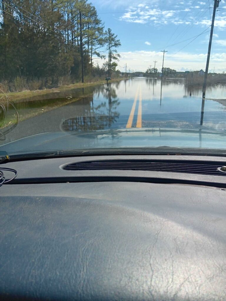 a view of a road through a windshield of a car (MyCoast AI)