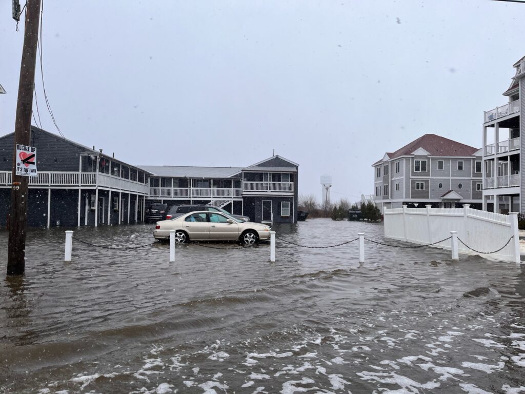 a car driving through a flooded street (MyCoast AI)
