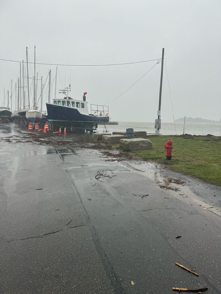 a boat is parked on the side of a road (MyCoast AI)