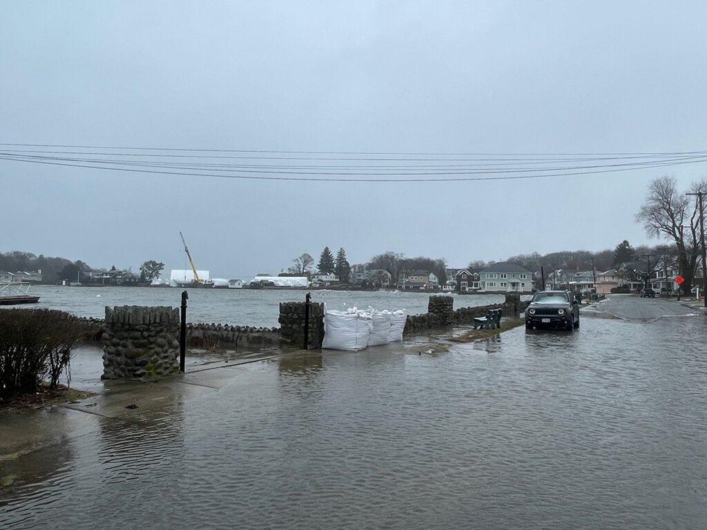 a car driving on a flooded road (MyCoast AI)