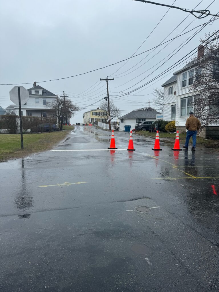 a person walking on a wet street (MyCoast AI)