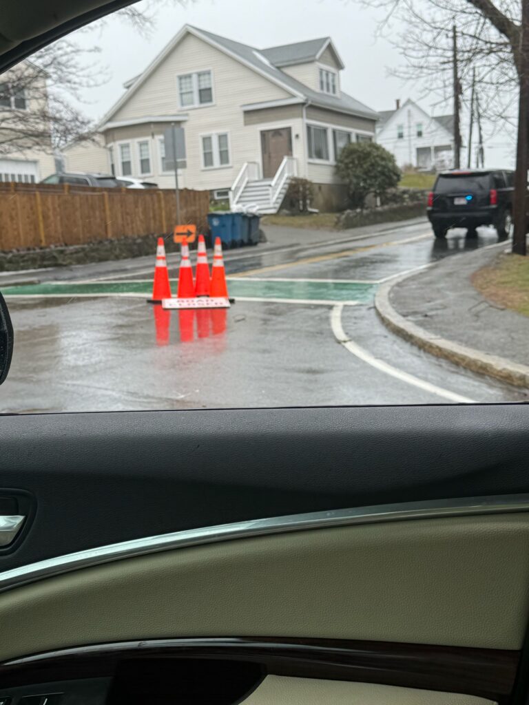 a car driving through traffic cones (MyCoast AI)