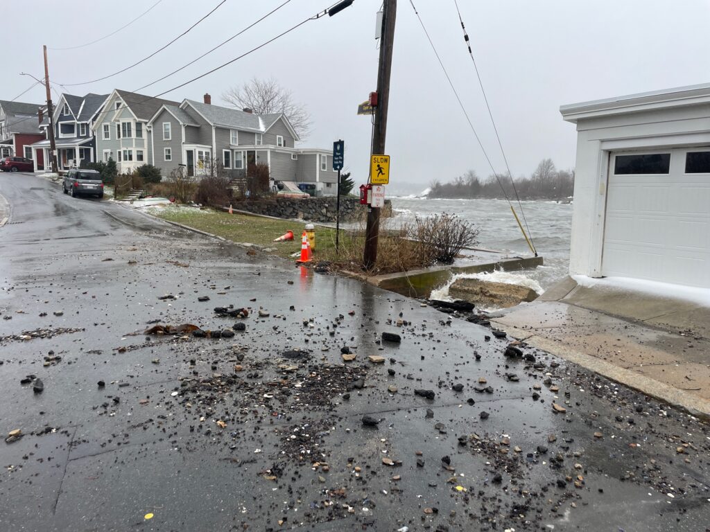 a flooded street with houses (MyCoast AI)