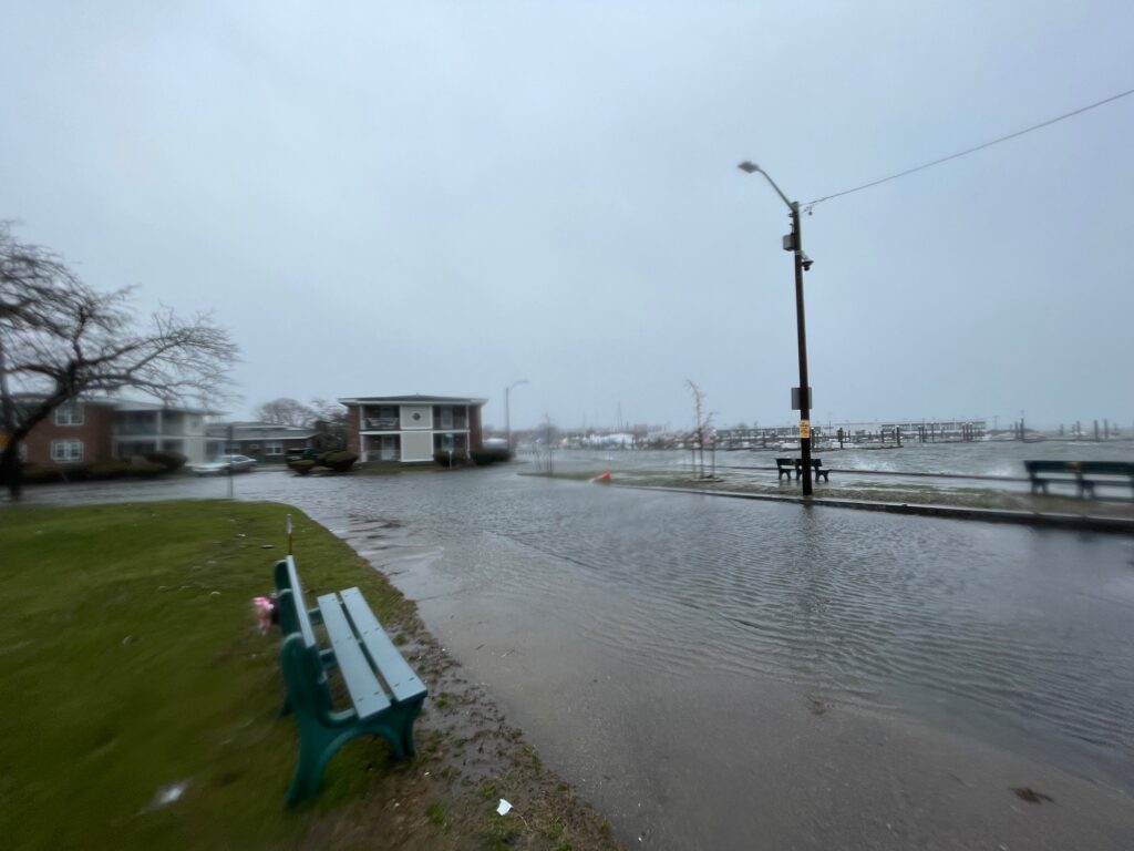 a bench sits in the middle of a flooded area (MyCoast AI)