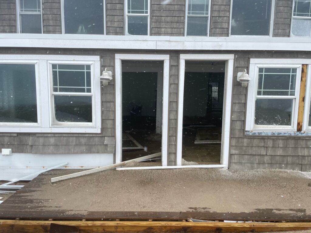 a building with windows and a door (MyCoast AI)