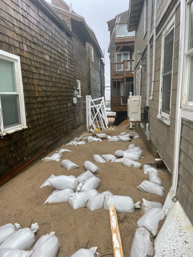 a pile of snow next to a building (MyCoast AI)