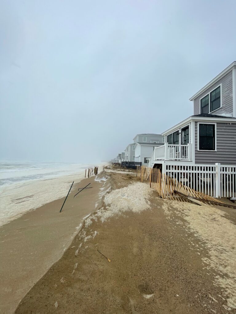 a row of houses on a beach (MyCoast AI)