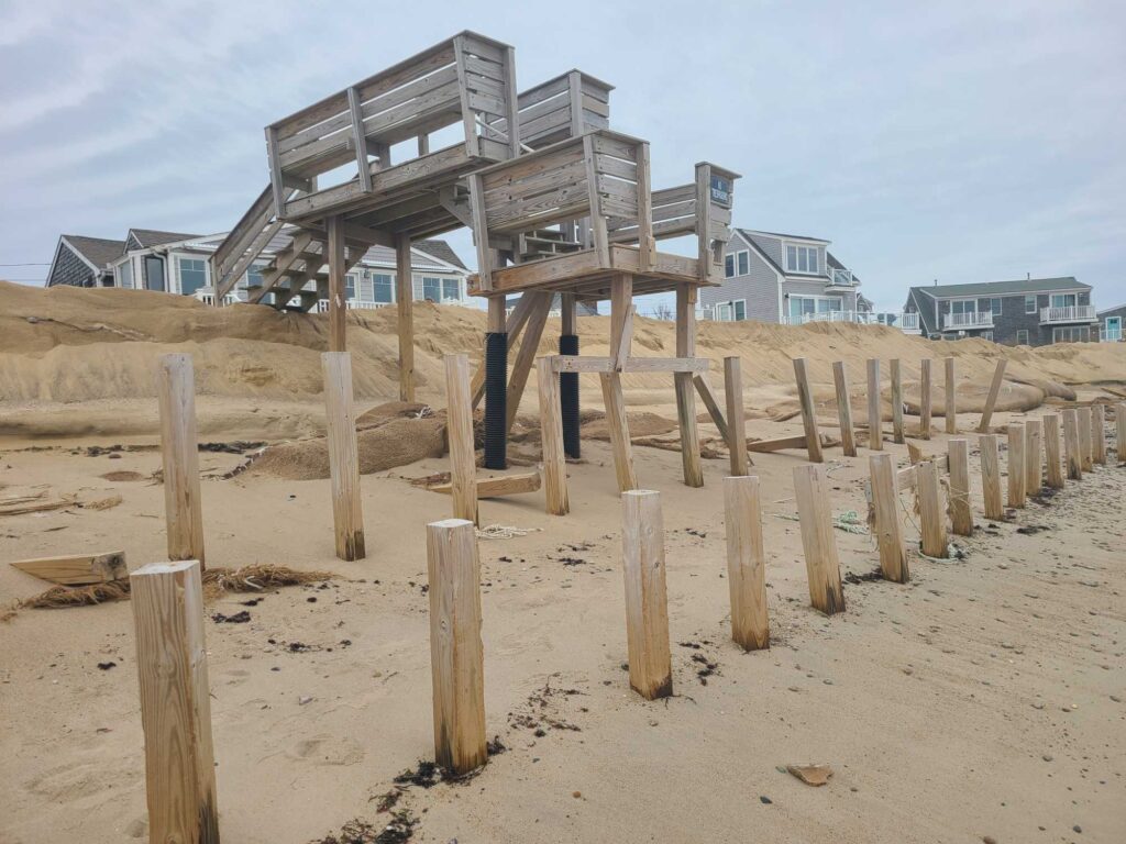 a structure made of wood on a beach (MyCoast AI)