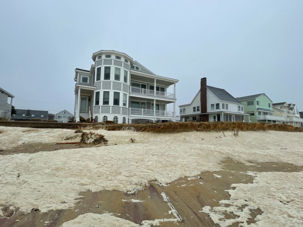 a beach with houses along it (MyCoast AI)