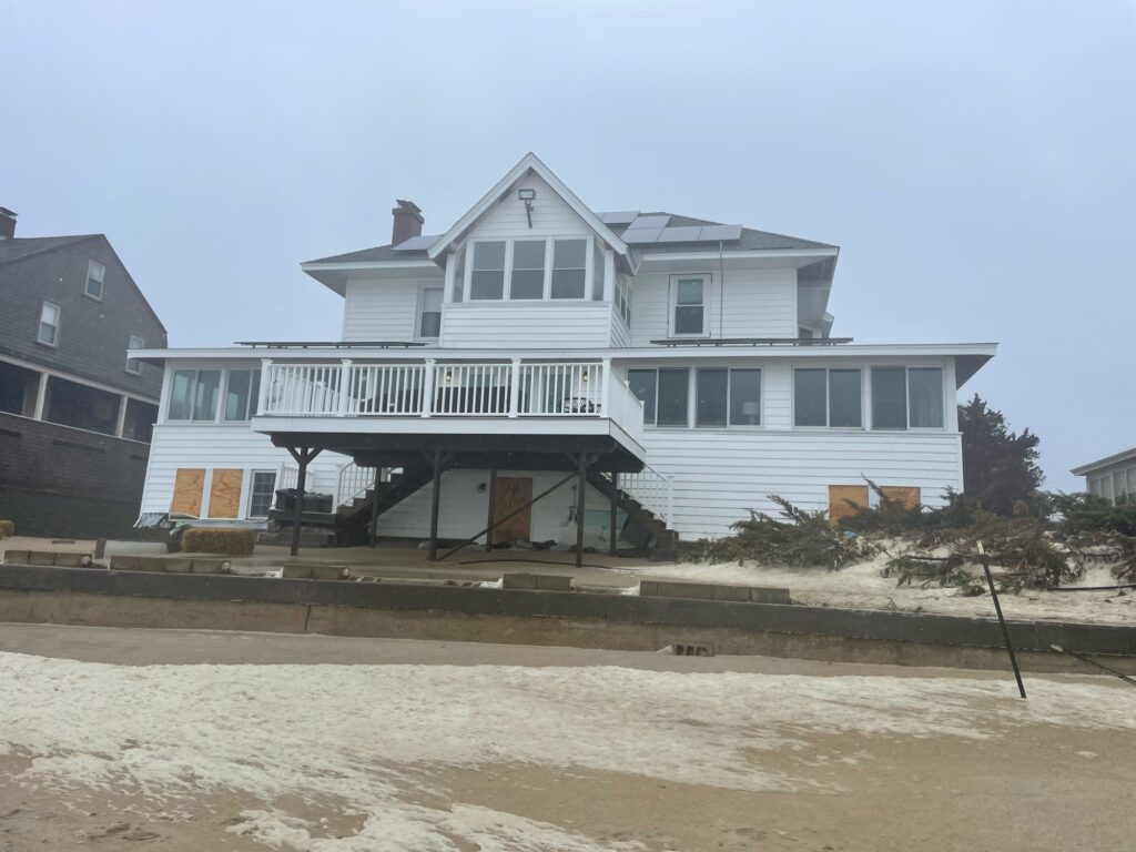 a house with a beach in the front (MyCoast AI)