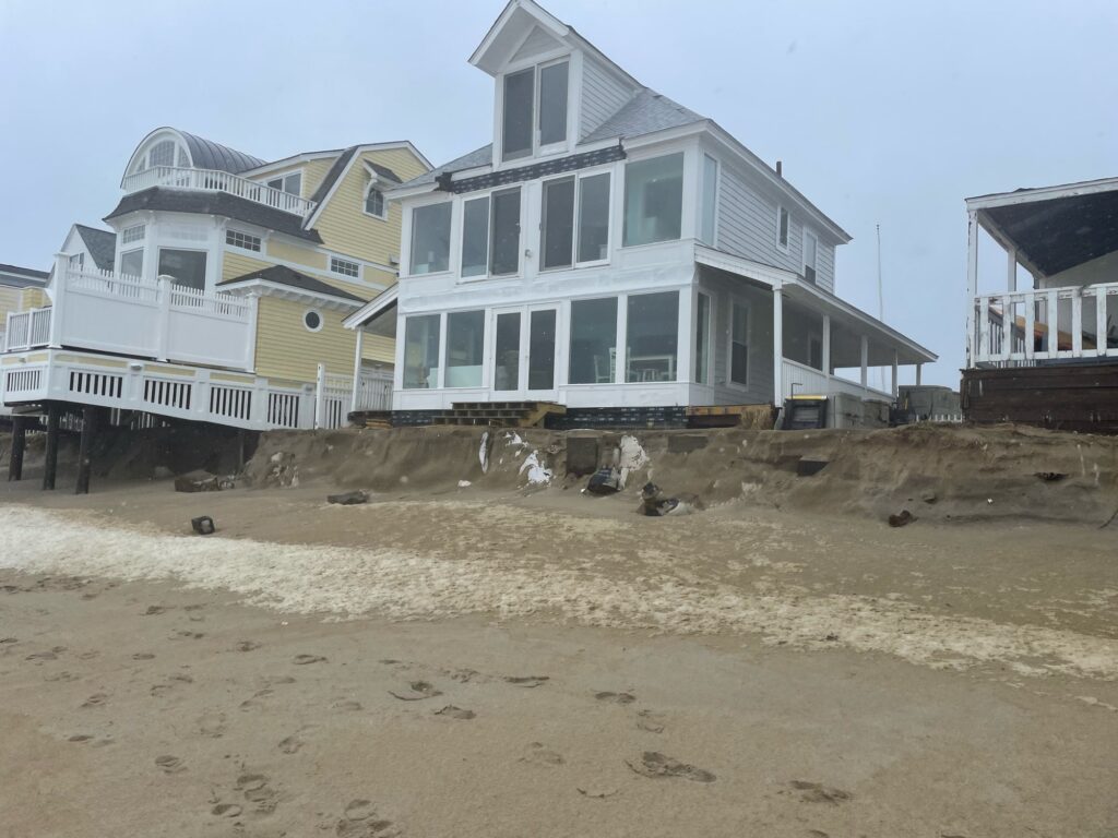 a group of houses on a beach (MyCoast AI)