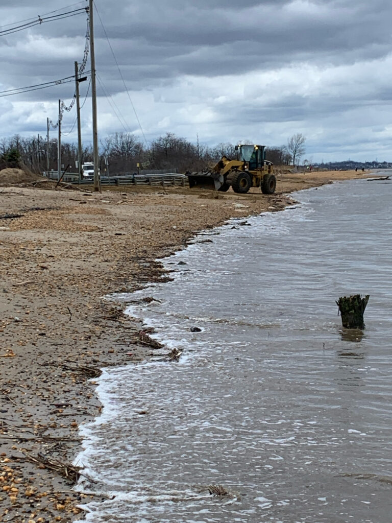 a tractor on a muddy road (MyCoast AI)