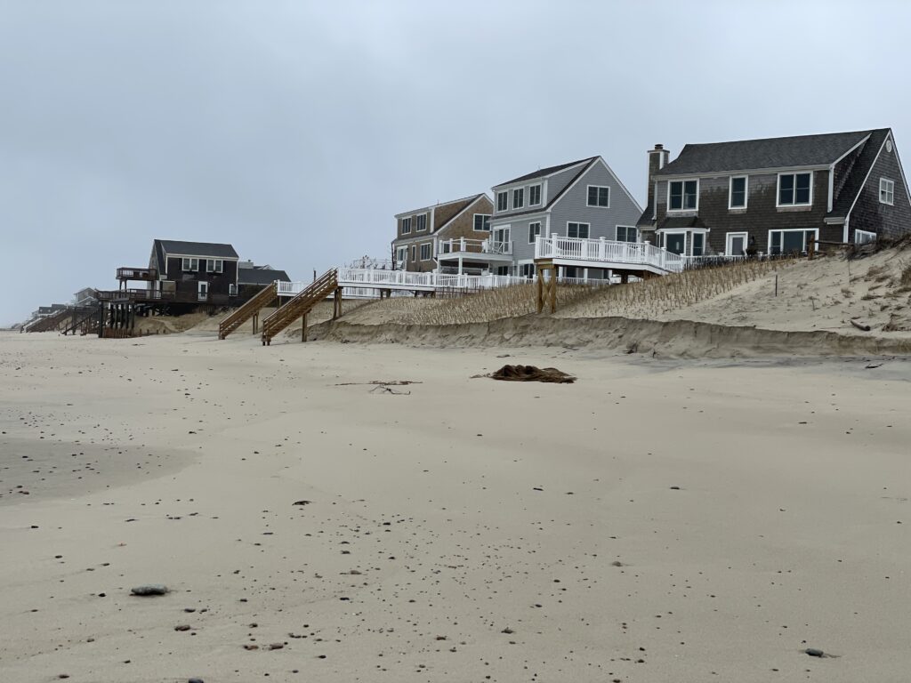 a beach with houses on it (MyCoast AI)