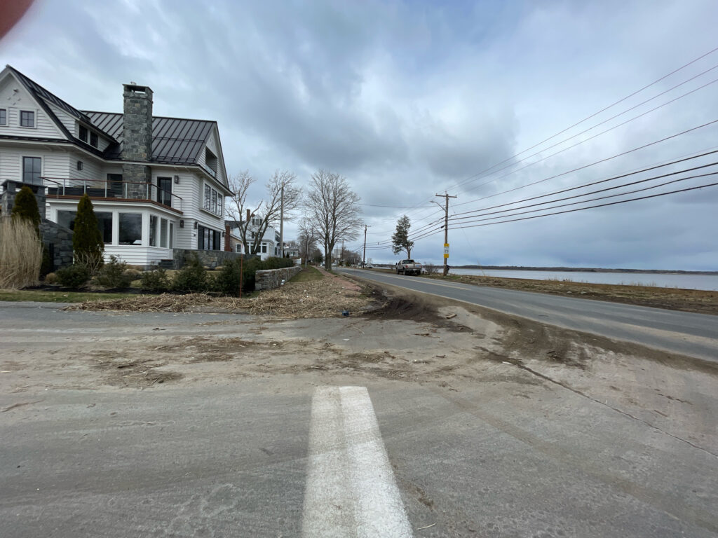 a road with houses along it (MyCoast AI)