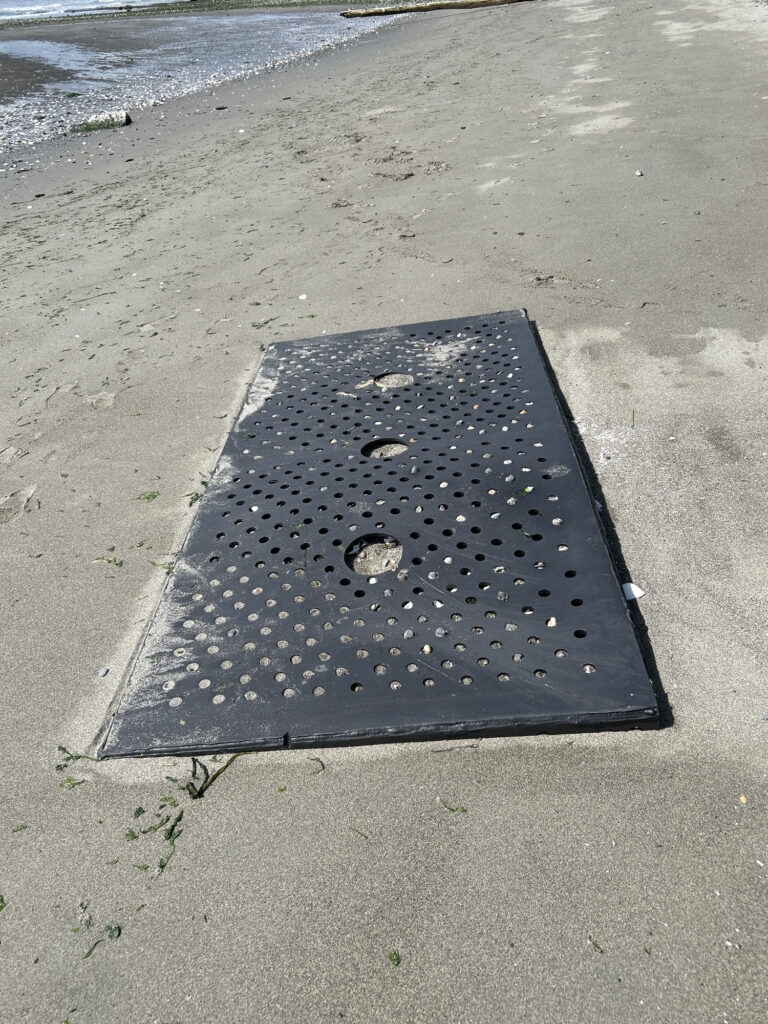 a black square object on a concrete surface (MyCoast AI)