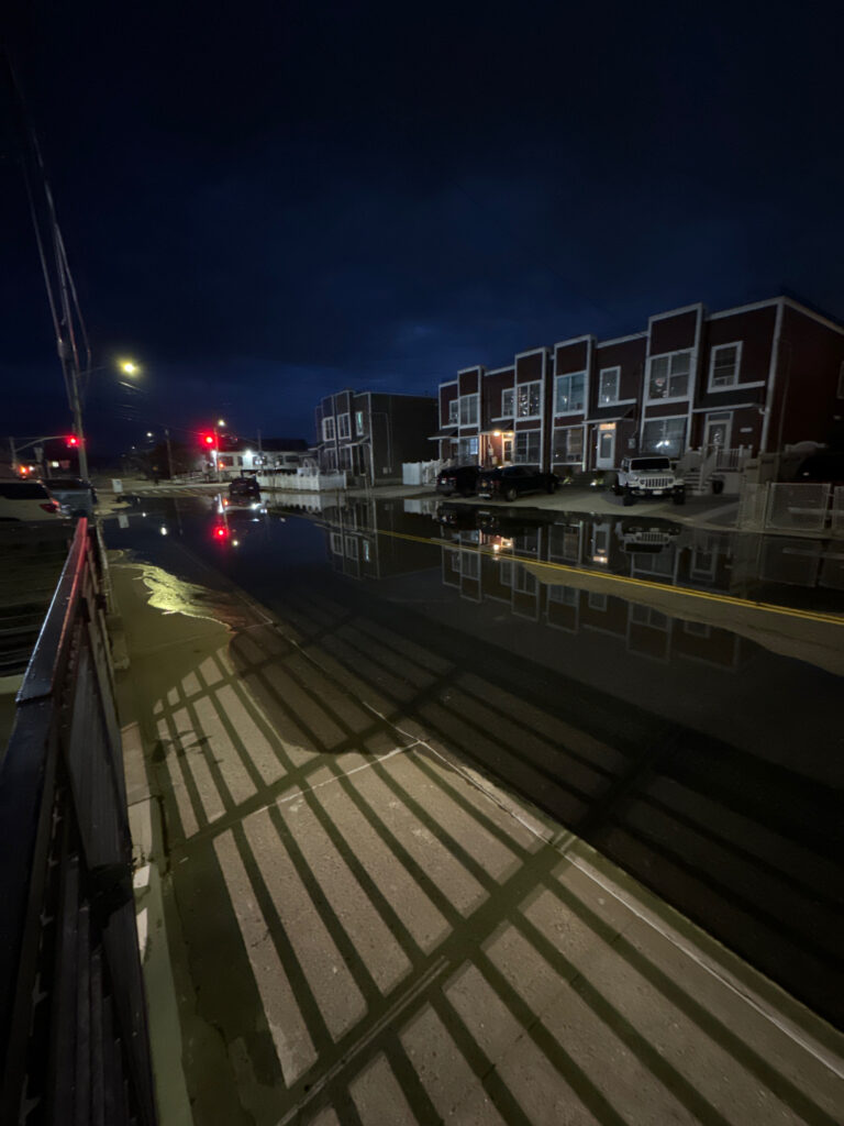 a walkway with buildings on the side (MyCoast AI)