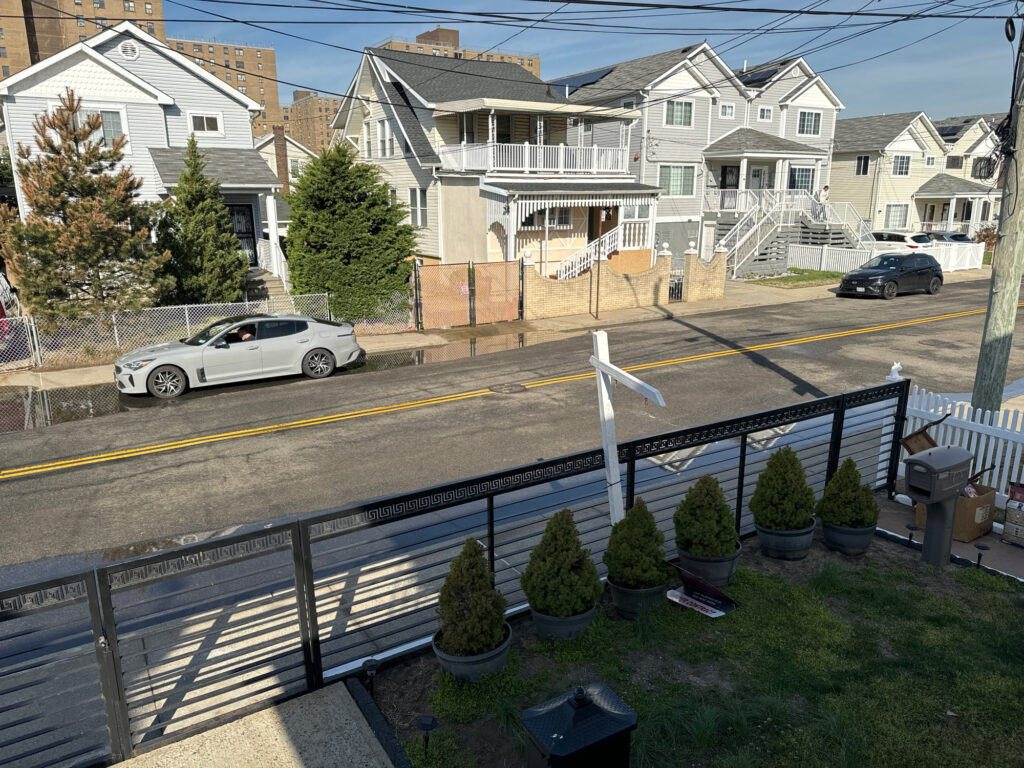 a street with houses and trees (MyCoast AI)