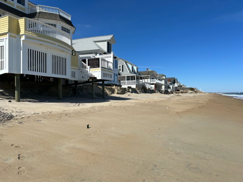 a row of houses on a beach (MyCoast AI)
