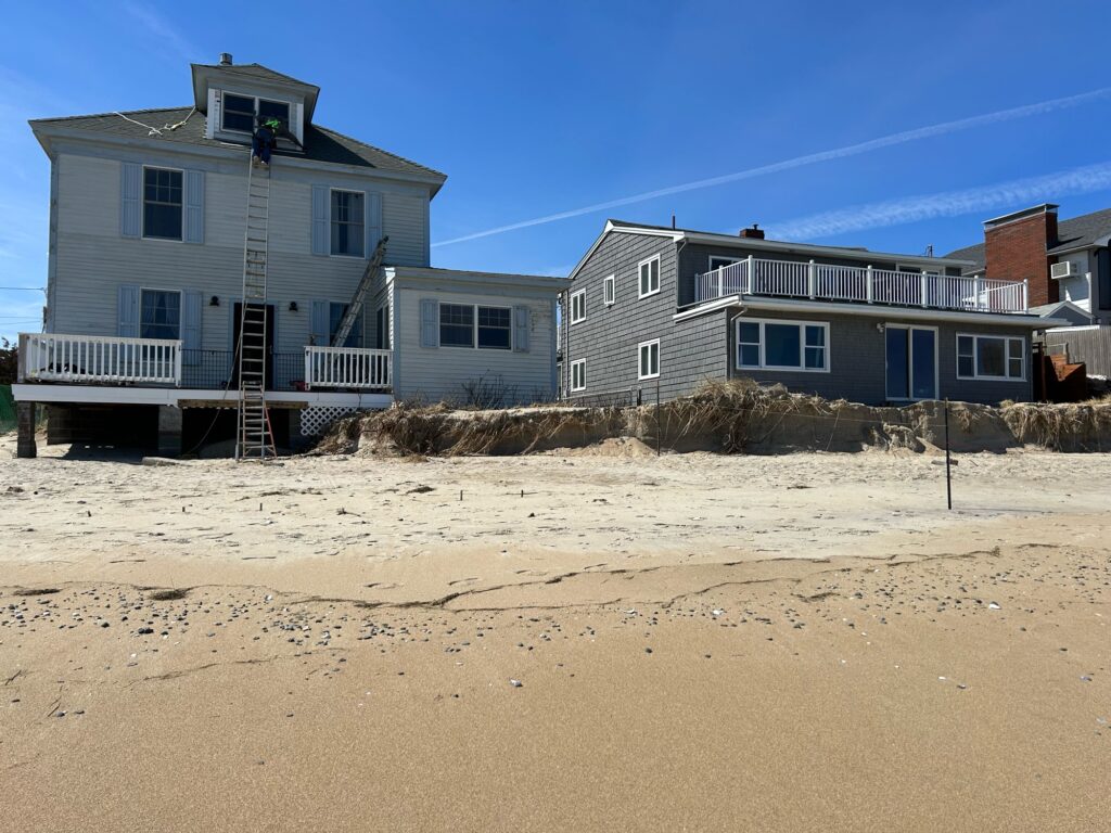 a beach with houses on it (MyCoast AI)