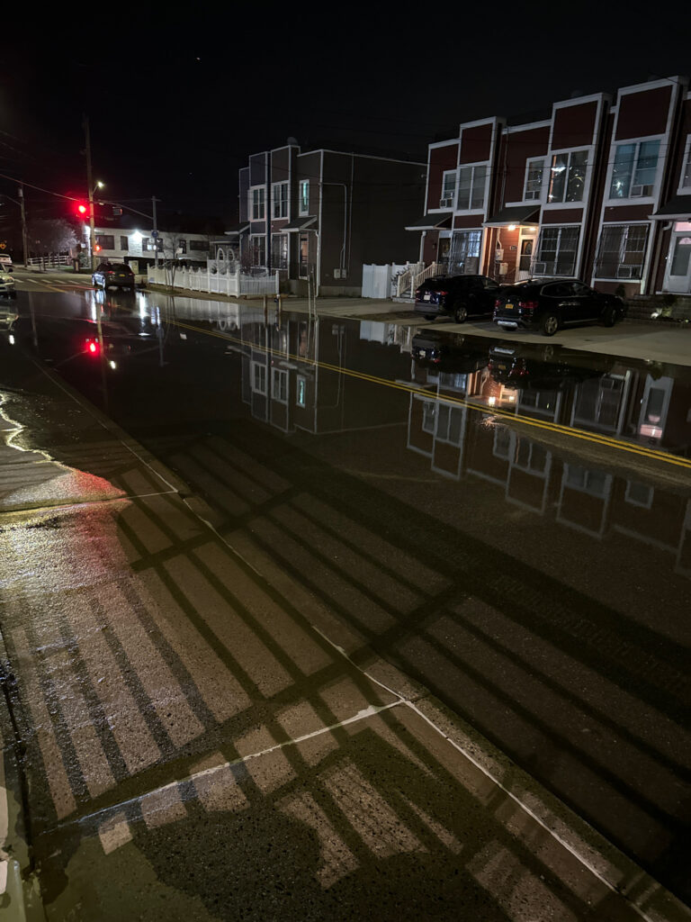 a wet street at night (MyCoast AI)