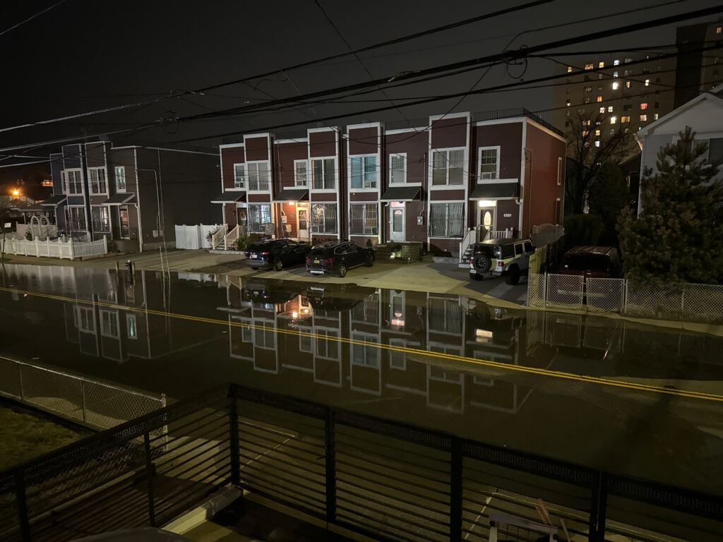 a building with a parking lot (MyCoast AI)