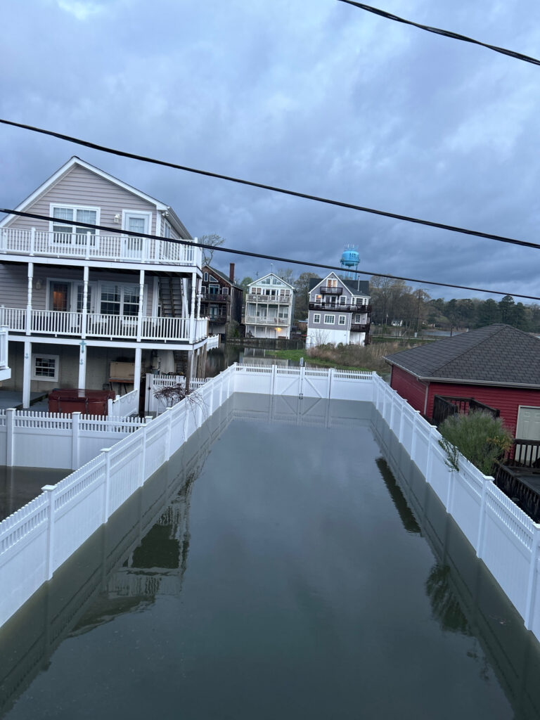 a pool of water surrounded by buildings (MyCoast AI)