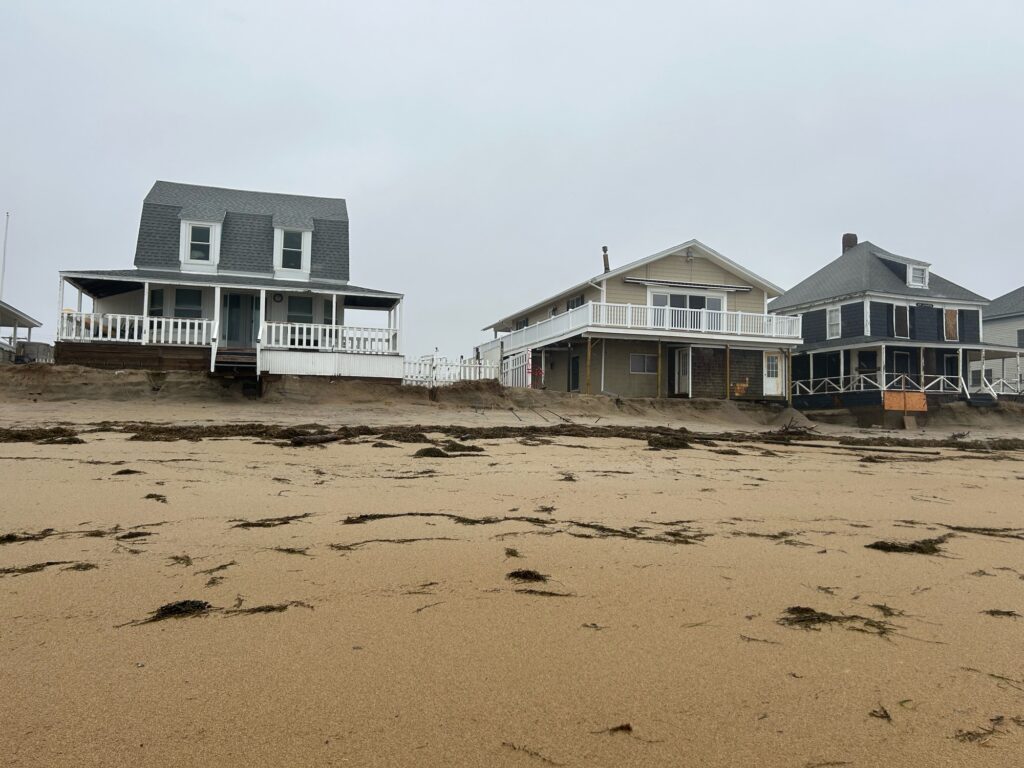 a row of houses on a beach (MyCoast AI)