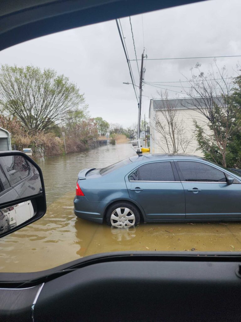 a car on a flooded street (MyCoast AI)